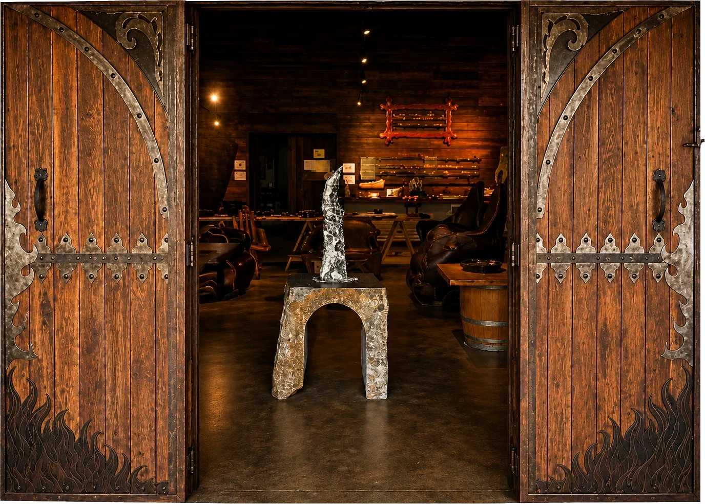 Open carved timber doors and a stone sculpture at Fishermans Road Art Gallery