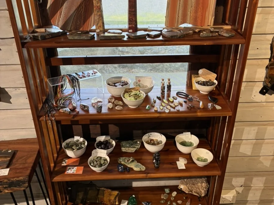 Display shelf with small ceramics, jewellery and crafted pieces