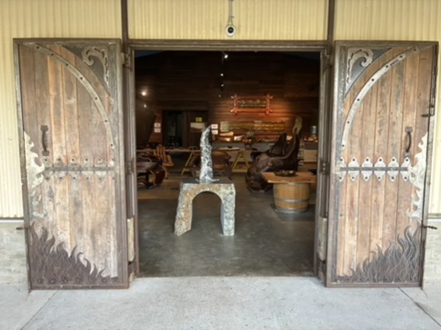 Open timber doors leading into the gallery
